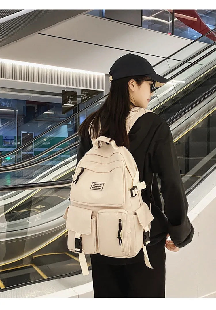 Soft black and white student backpack with laptop compartment and 3D pocket