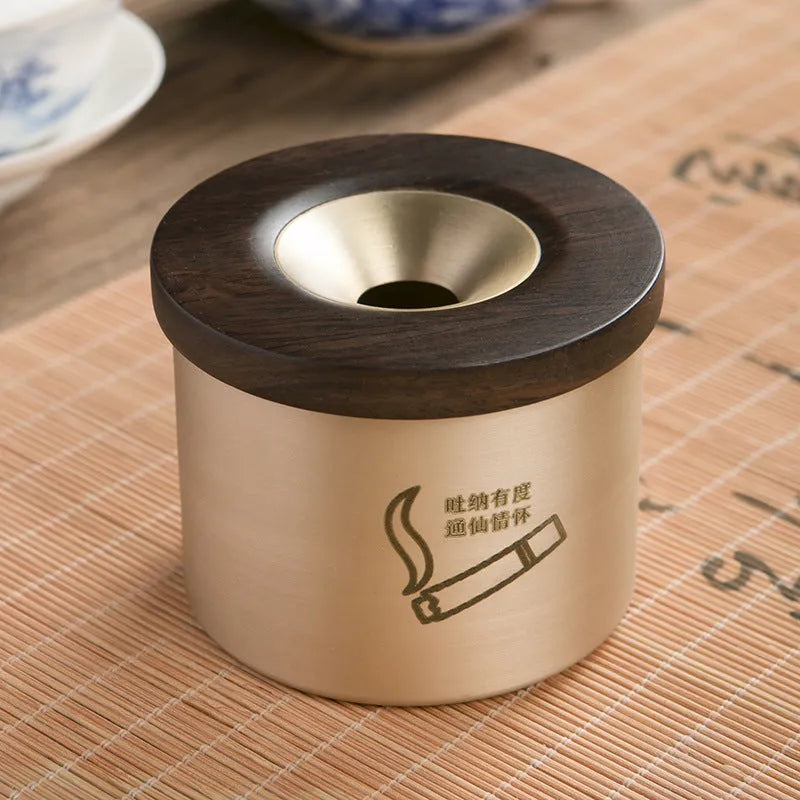 Solid copper retro ashtray with a wooden lid in black or rosewood, showing central air hole.