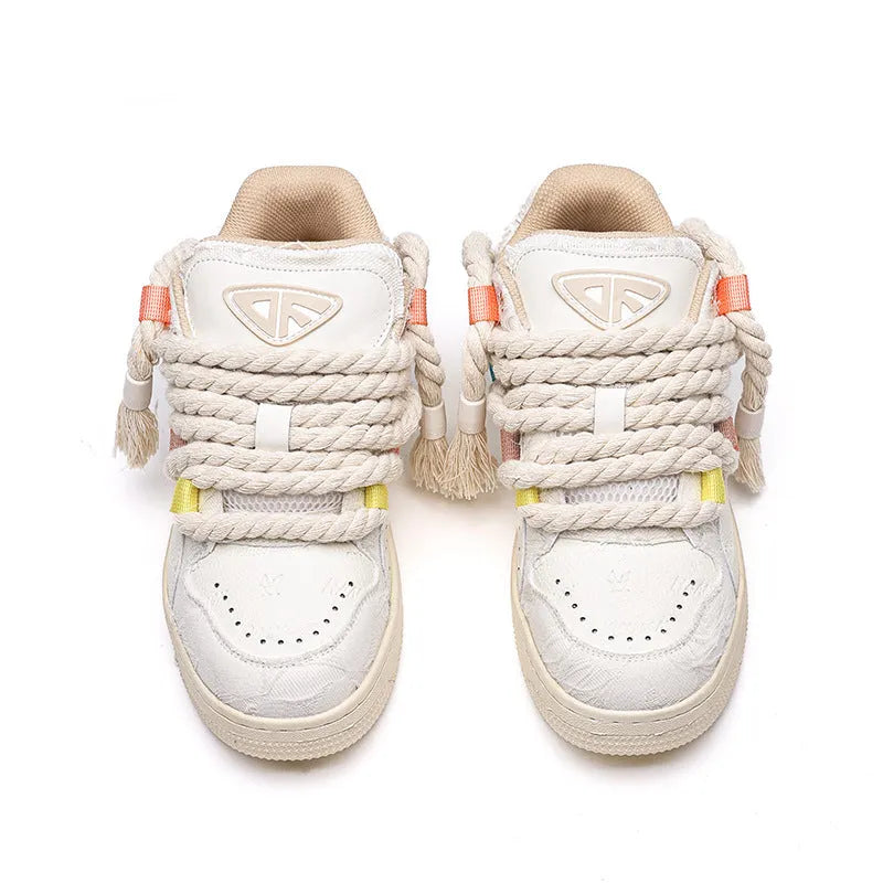 Creamy white retro skate shoes with old damage lace design and low-top construction