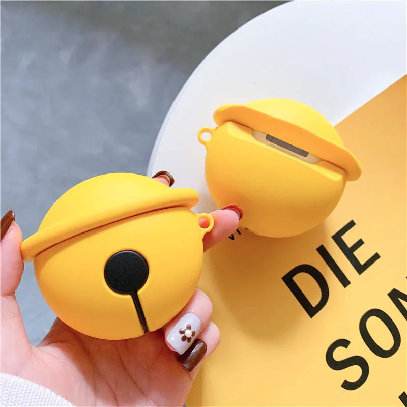 Yellow silicone bell-shaped case for AirPods with metal keychain ring attached