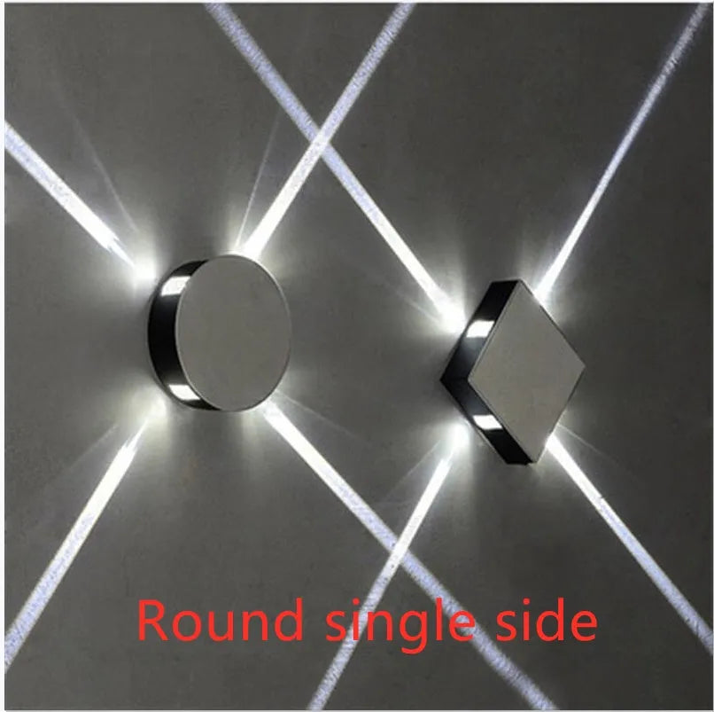 Modern square and round aluminium LED wall light with iron shade in warm white or white.