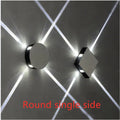 Modern square and round aluminium LED wall light with iron shade in warm white or white.