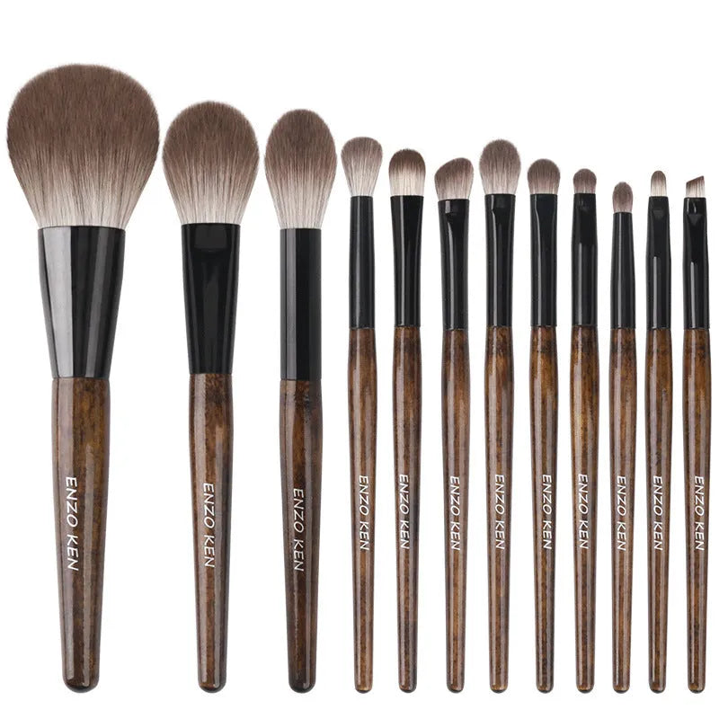 12 piece makeup brush set with wooden handles and soft artificial bristles in a PU travel bag