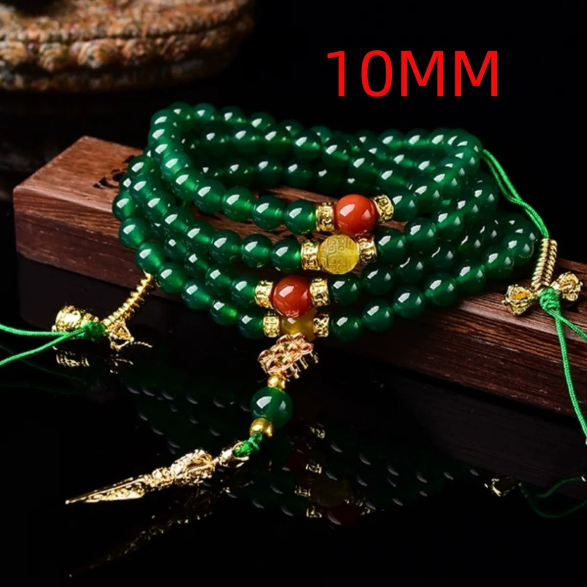 Handcrafted multi-circle green agate bracelet with natural stone beads on a wrist.