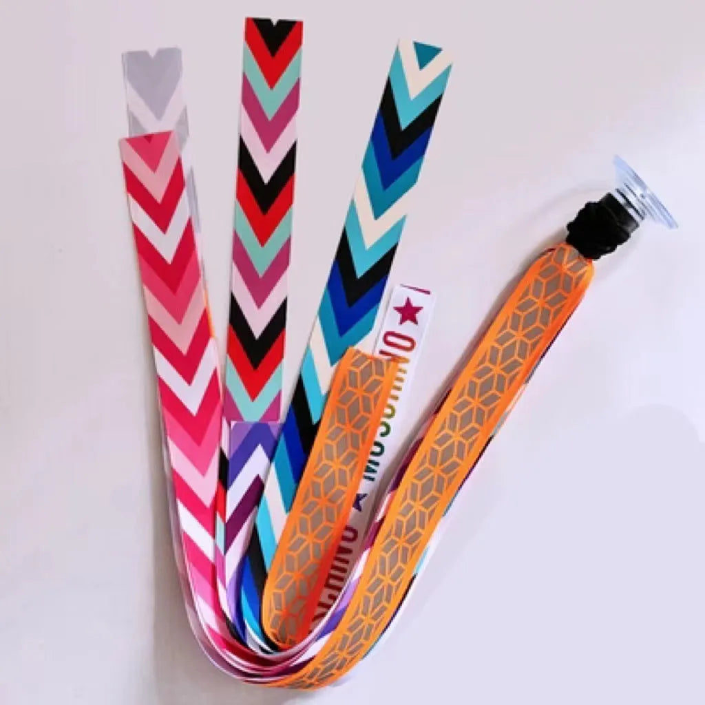 Decorative ribbon streamer for a child's ski or skating helmet in various colour options.
