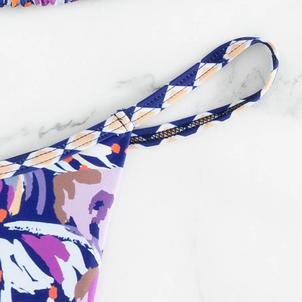 Women's floral print polyester swimsuit with triangle top and matching briefs