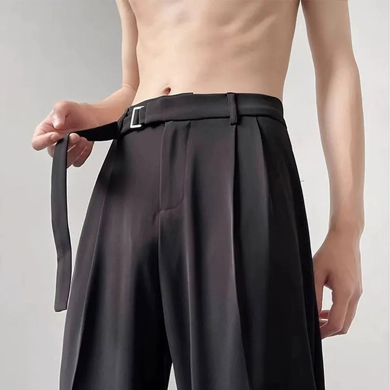 Black thin straight wide leg casual trousers with a loose fit and straight leg opening.