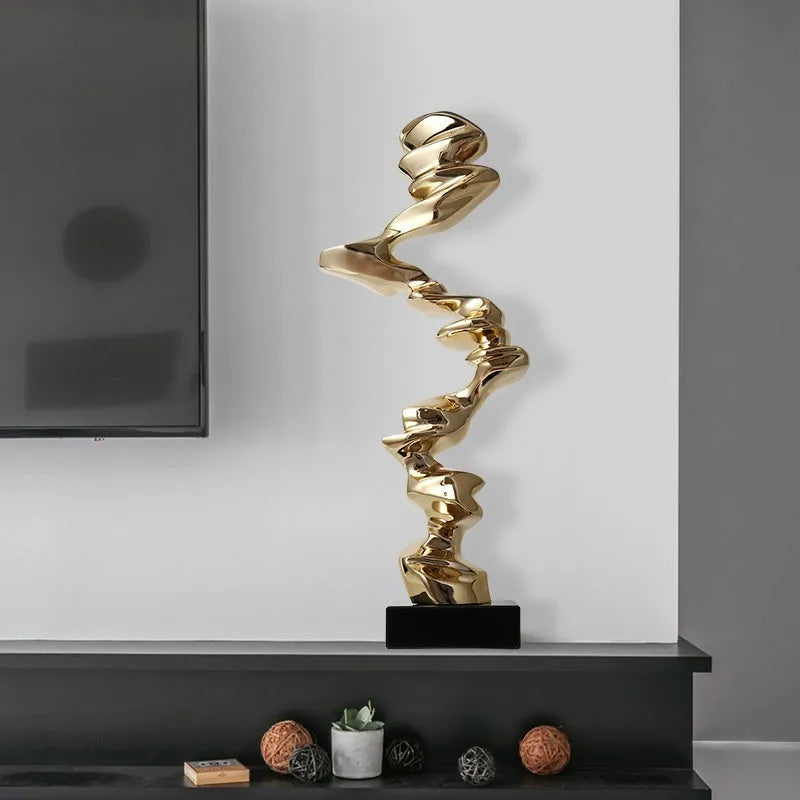 Minimalist abstract still life resin ornament in bright gold, silver, or phantom blue for modern decor.