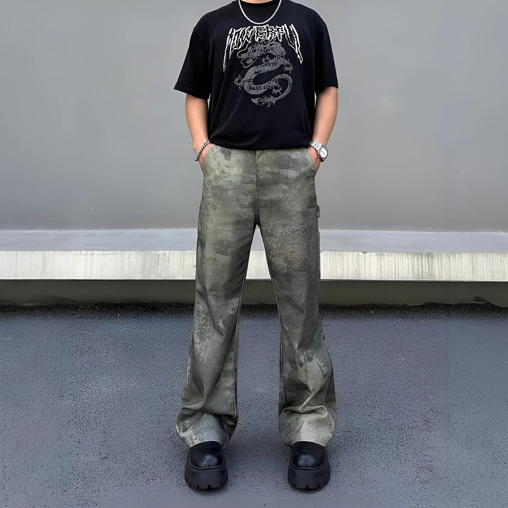 Men's straight-leg jeans with a retro digital camouflage pattern on blue denim.