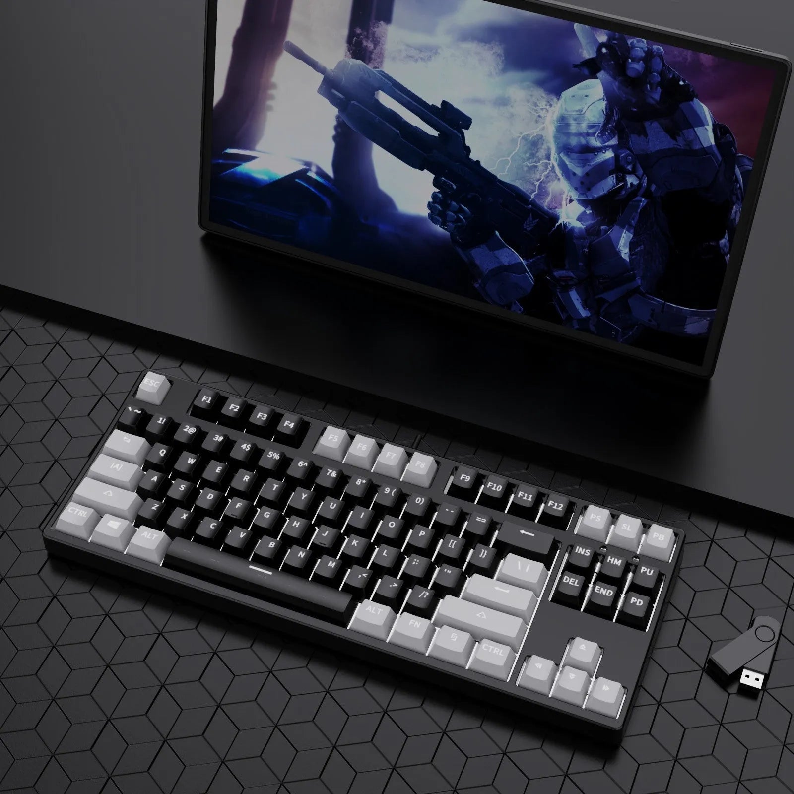 87-key wired mechanical gaming keyboard with multi-colour keycaps on a metal body.
