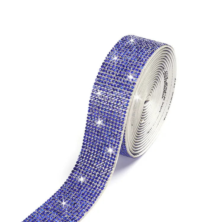 A long strip of electroplated glass self-adhesive water drill for clothing decoration in white and AB colour.