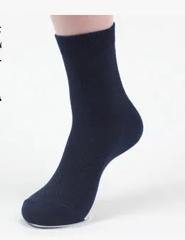Men's bamboo fibre socks with a small square pattern in black, grey blue, iron grey, navy blue, and silver grey.