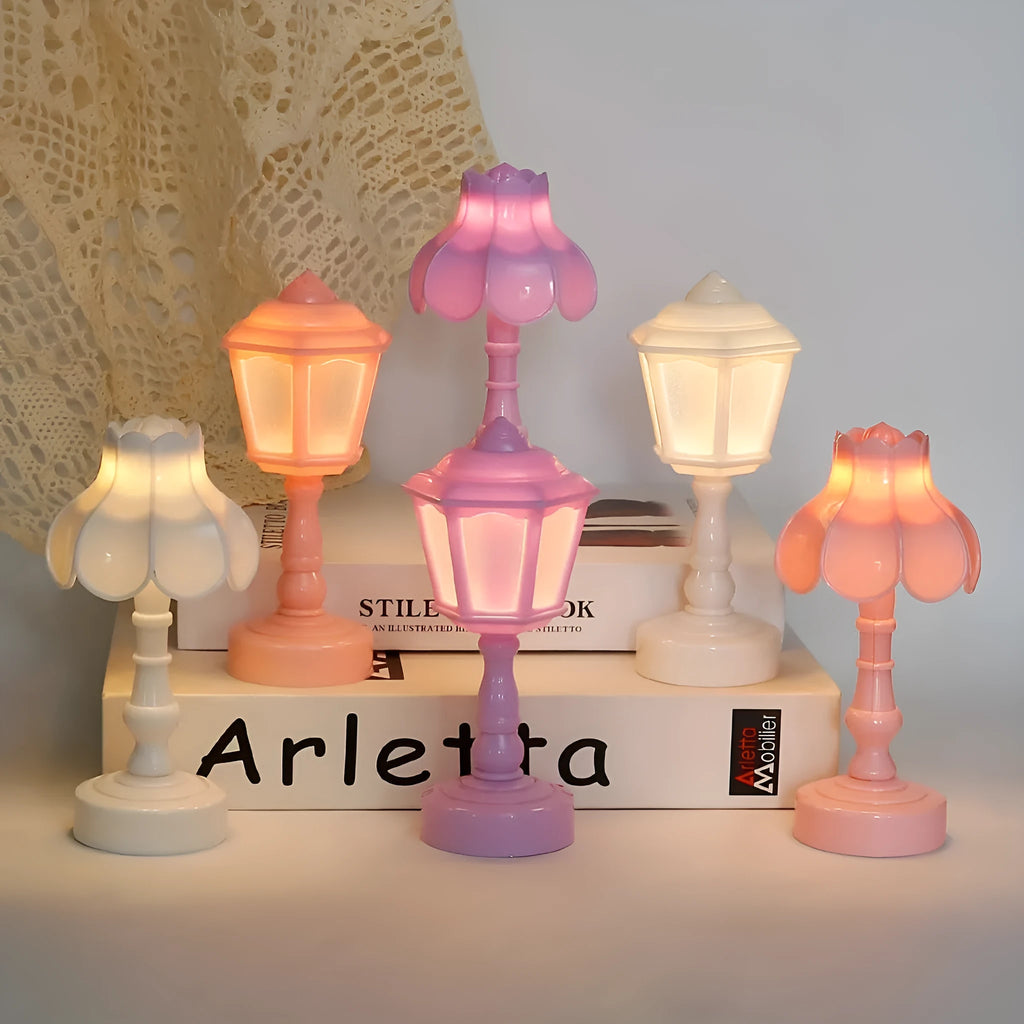 Retro pagoda-shaped small night lamp in light purple colour with geometric design.
