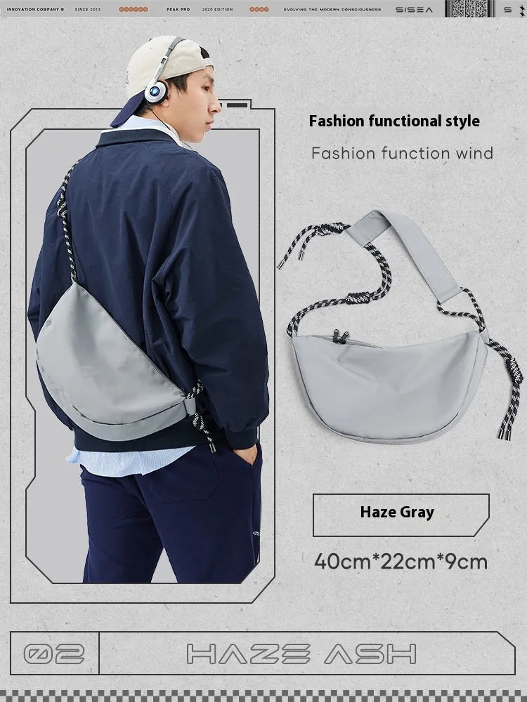 Nylon messenger bag for men in black colour showing large capacity design with shoulder strap