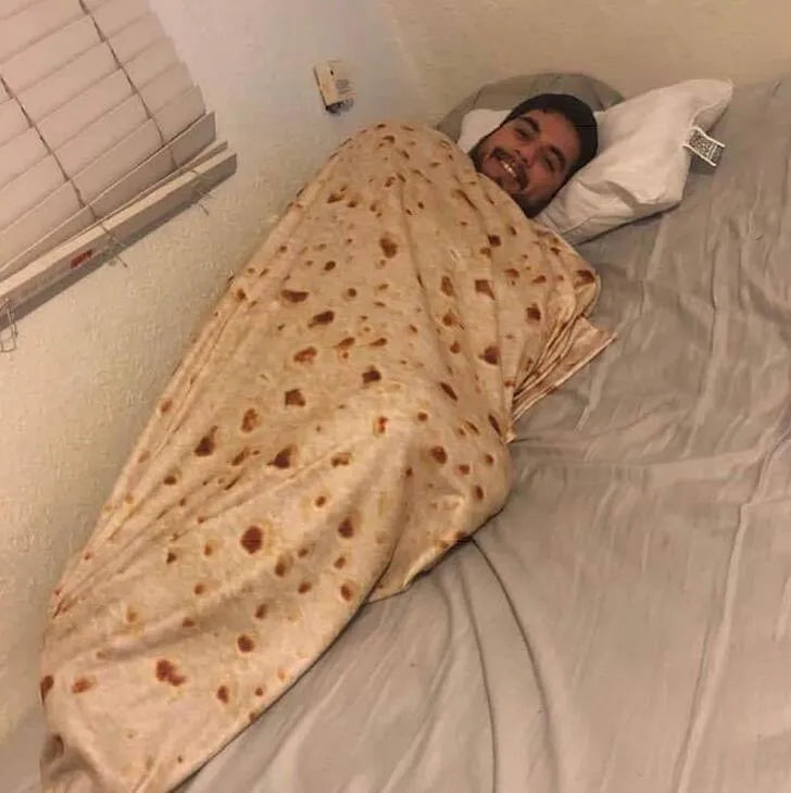 Round shape flannel burrito blanket with food-themed printing showing coral fleece texture