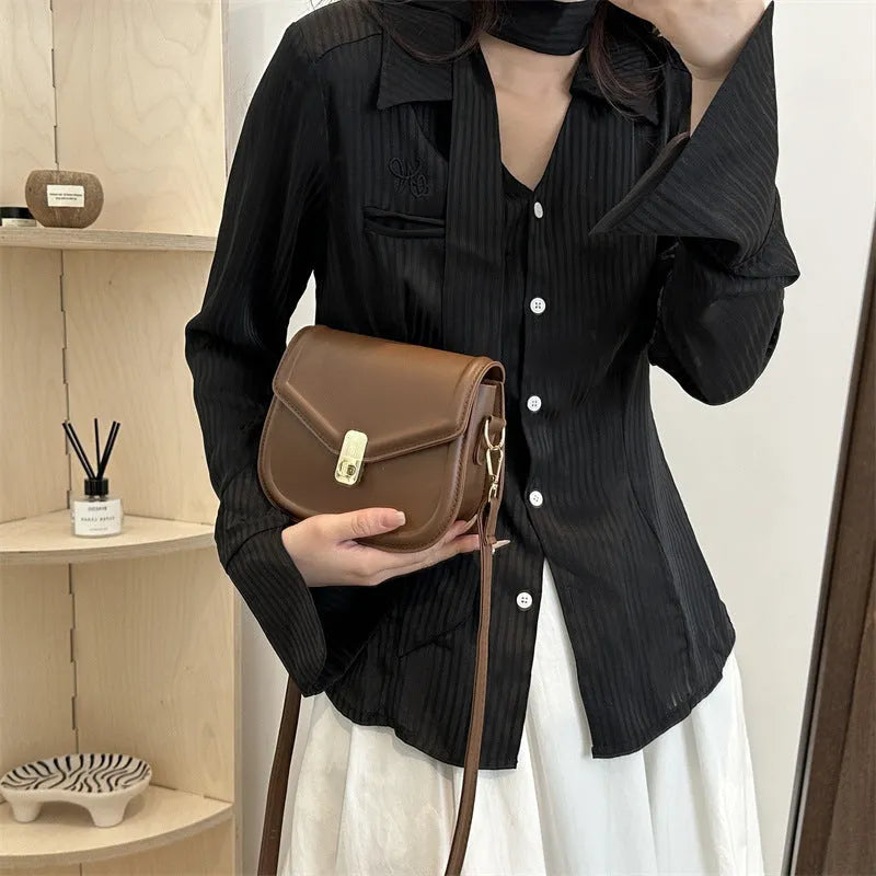 Soft PU clamshell messenger bag in horizontal square design shown in black colour