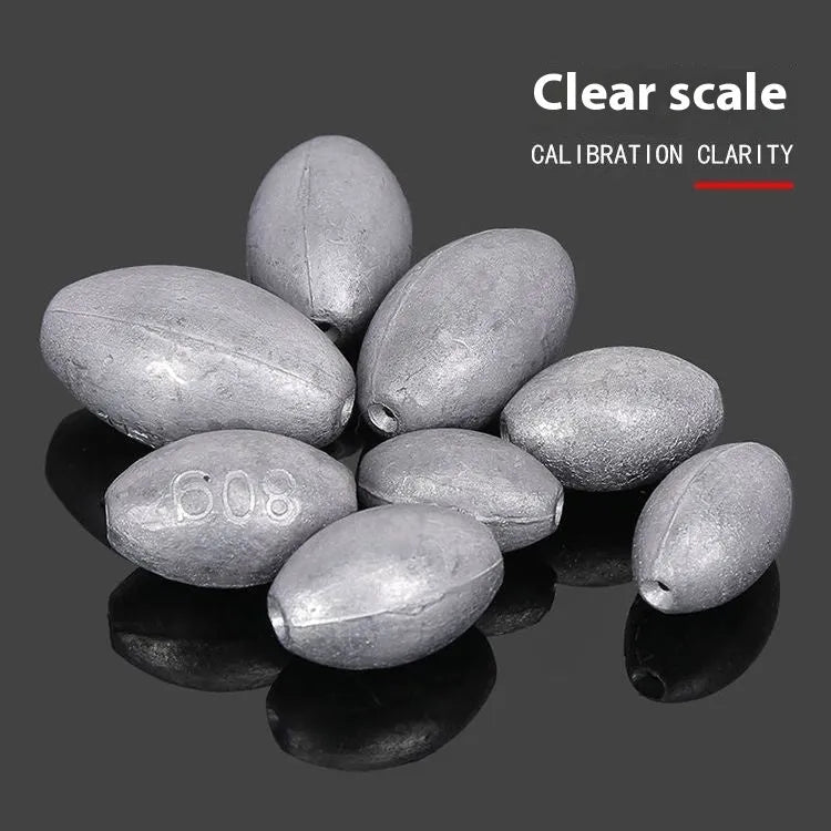 Olive rugby-shaped fishing sinker with scaled texture and plastic core in various weights from 10g to 150g