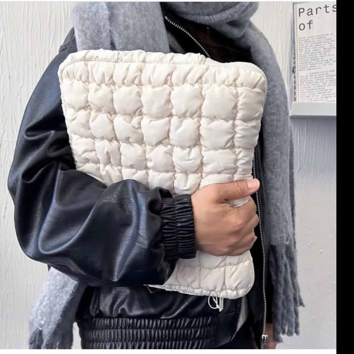 Large black nylon laptop bag with cloud cotton interior, shown open to reveal storage compartments.