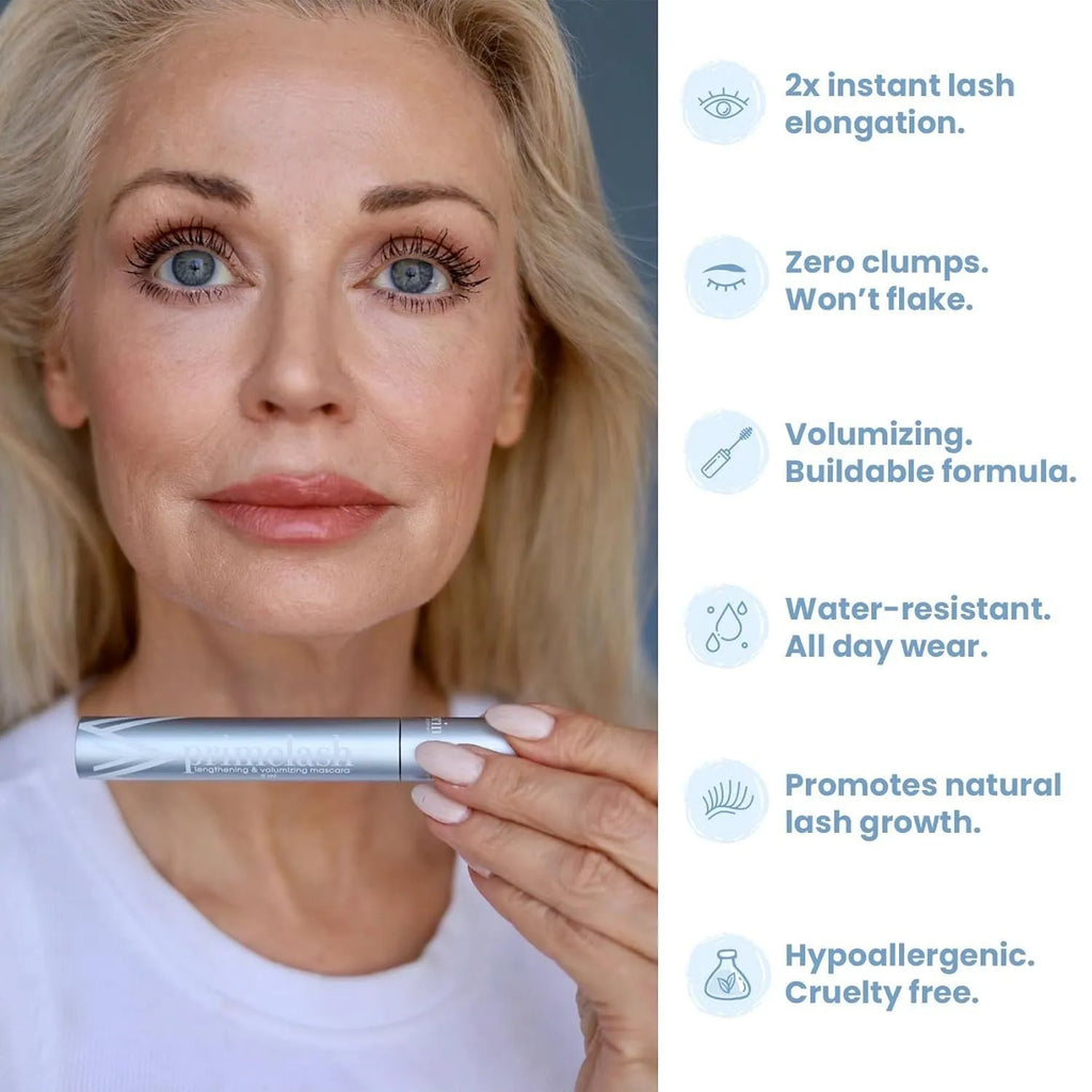 Eye black make-up tool with a small brush head and integrated comb for eyelash application and grooming.