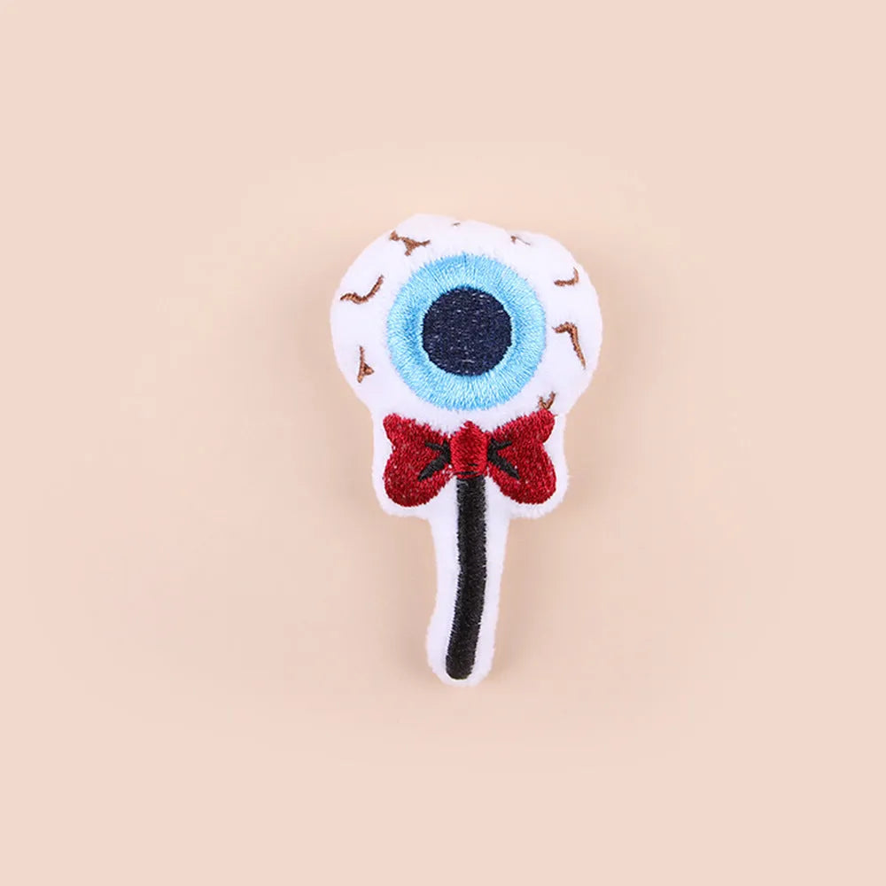 Plush cat teaser toy with long wand handle and small eyes design attachment