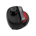 Black USB game stick controller with compact dimensions on gaming desk