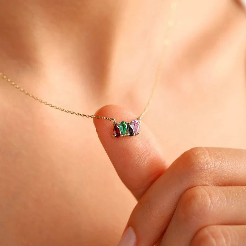 Zircon birthstone pendant on a titanium steel clavicle chain in silver, gold, or rose gold finish.