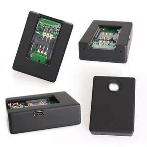 Black N9 mini car GPS tracker X009 with removable back cover showing SIM card slot