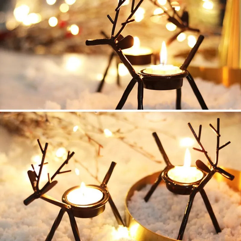 Black iron elk Christmas candlestick holder on table with candle