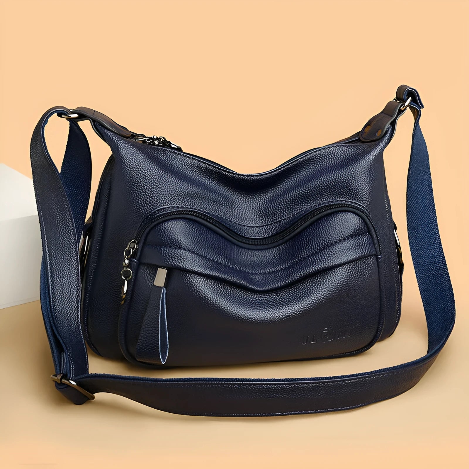 Large black women's shoulder bag with multiple internal organisation pockets and crossbody strap