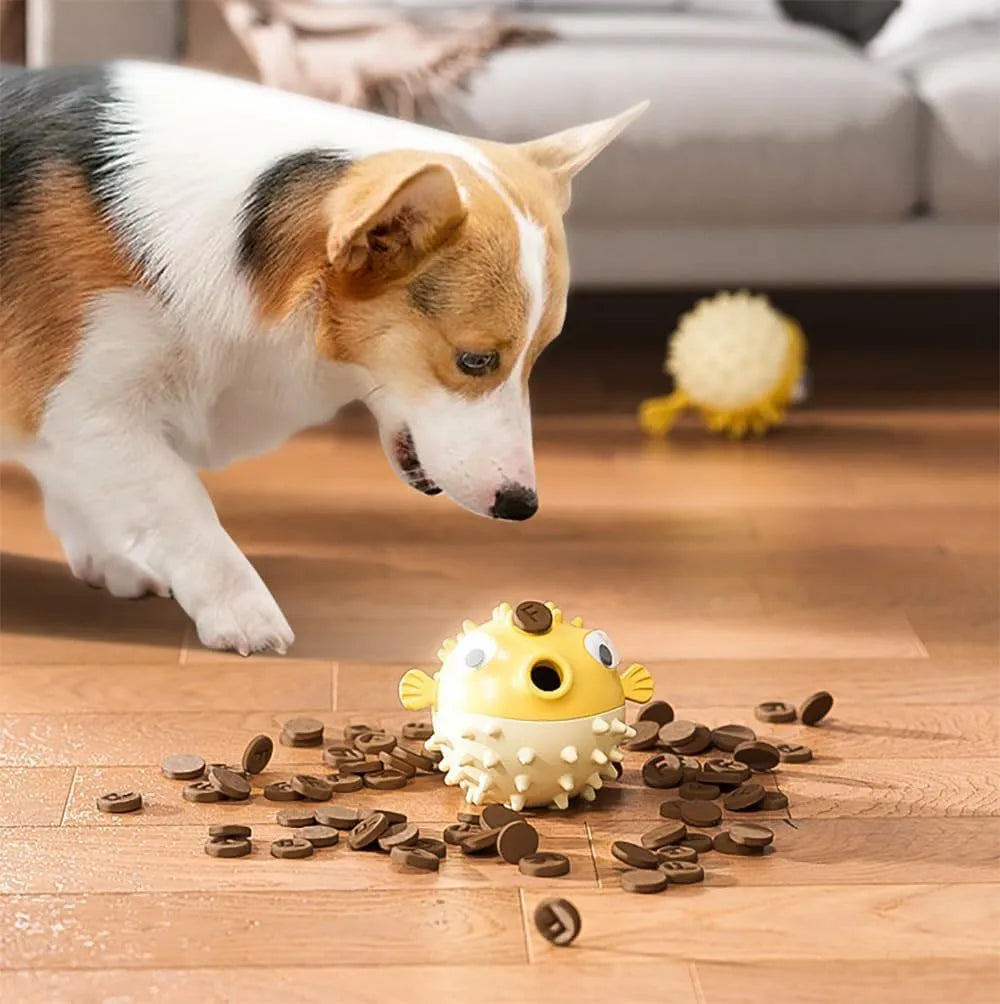 Fish-shaped interactive dog toy with treat dispensing in green, red, or yellow colours