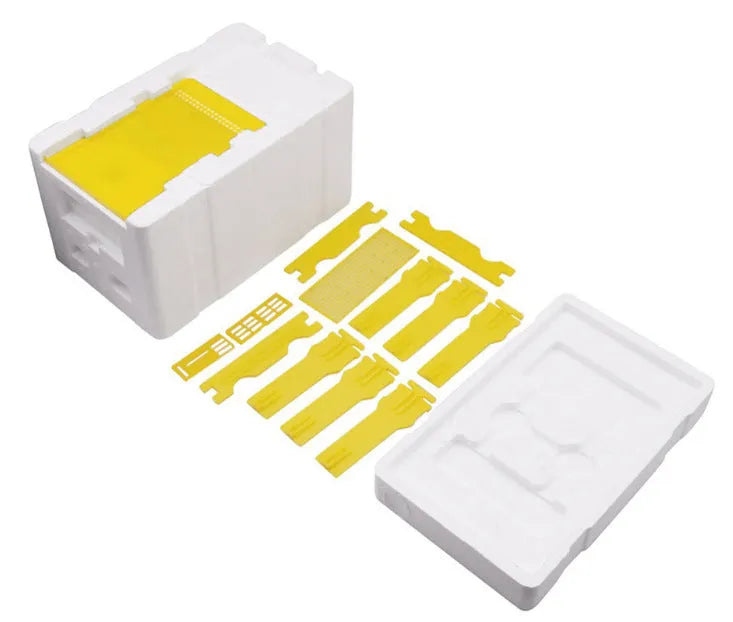 Three white EPS foam mini delivery boxes for beehive queen rearing.