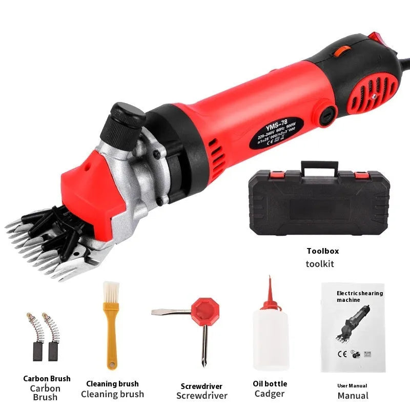 Yellow-handled electric sheep shears with blades and accessories inside a plastic storage box.