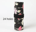 Canvas pencil case roll with ballet girl print, shown unrolled to display multiple pencil pockets.
