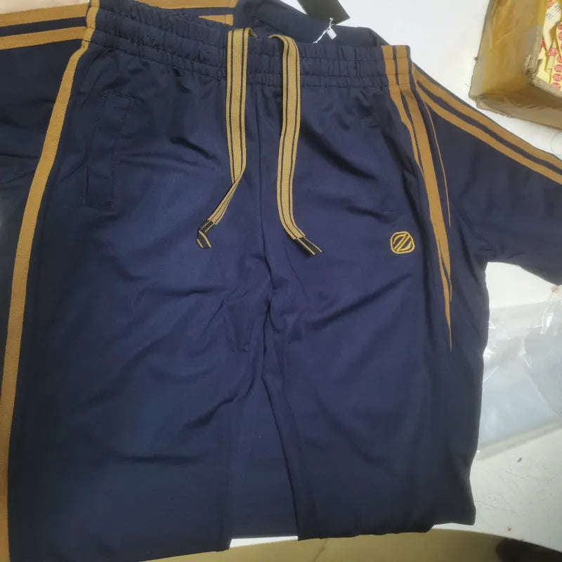 Men's blue polyester sports suit set with short sleeve top and matching trousers