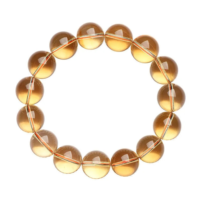 Natural citrine scattered beads ball bracelet showing 7A and 6A colour grade options on a wrist.