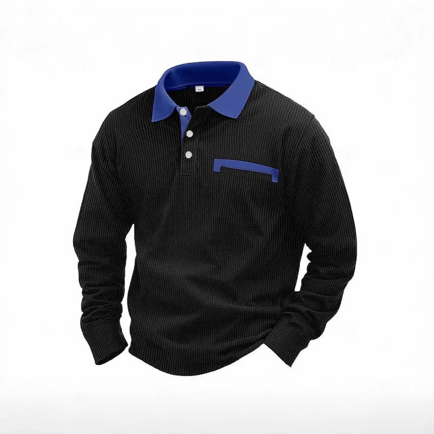 Man wearing a long-sleeved waffle knit polo shirt in a loose, retro style.