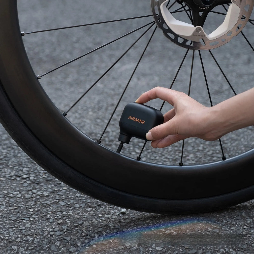 AS100 black electric bike pump with USB cable and waterproof storage bag