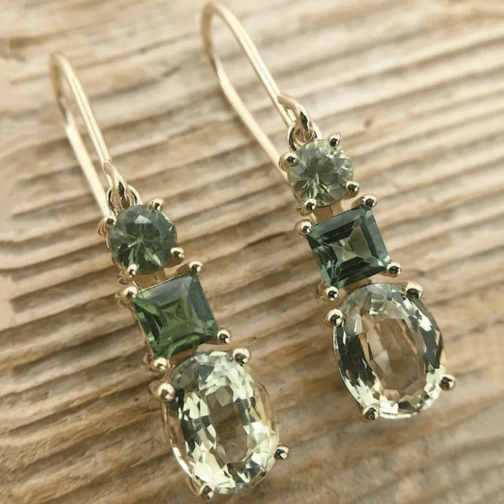 Green geometric quadrilateral copper earrings in a retro Bohemian unisex style.