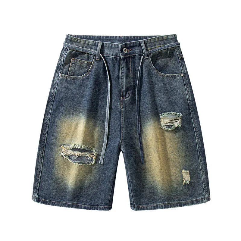 Retro blue loose fit ripped jeans with distressed detailing and cotton denim construction