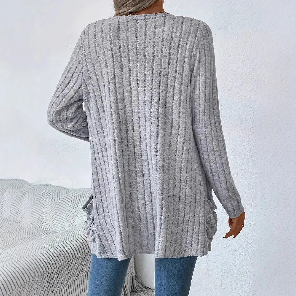 Solid colour loose fitting long sleeve cardigan with front pockets in Grandma grey