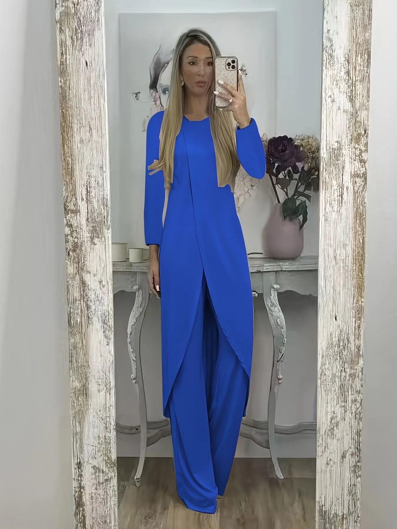 Casual long sleeve two-piece set with loose round neck top and matching trousers in polyester