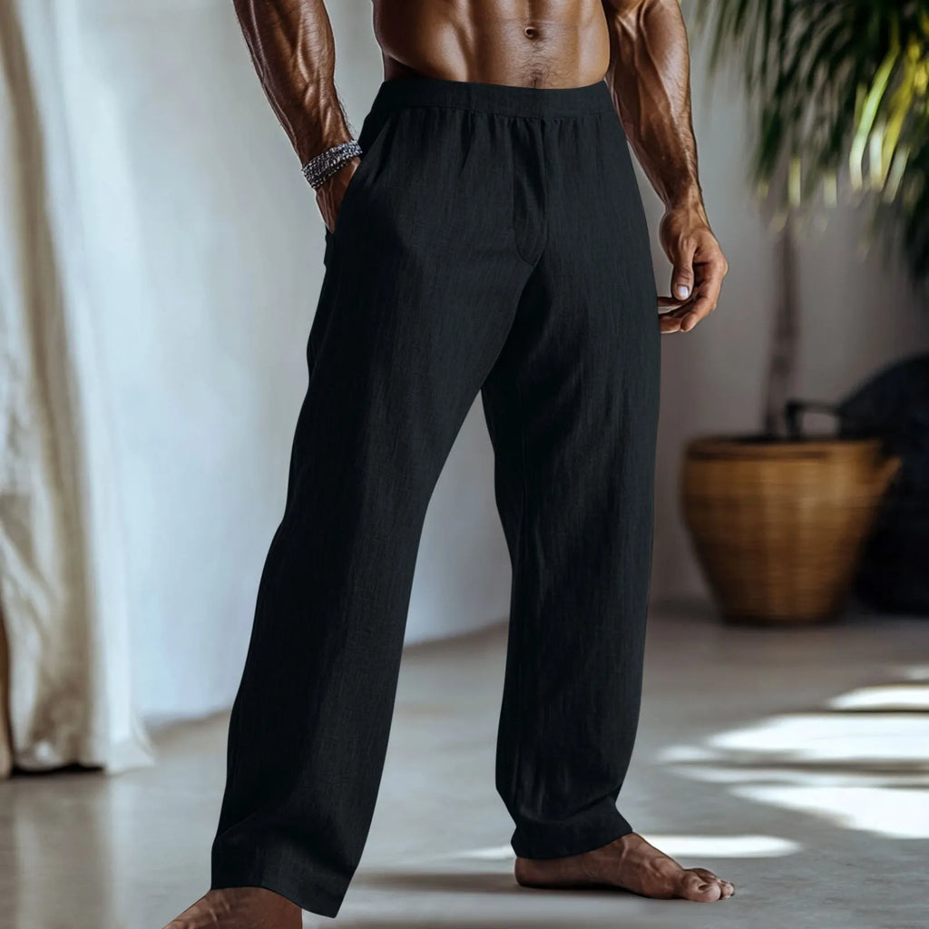 Straight leg cotton linen trousers in light green colour showing front view with pockets