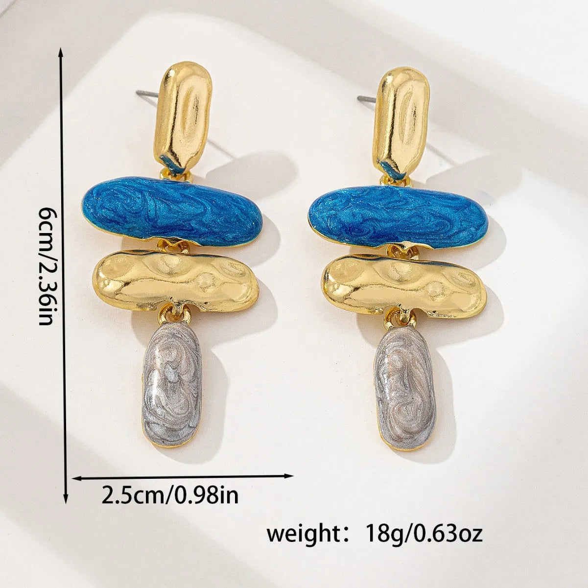 Geometric stud earrings with multicolour electroplated finish on zinc alloy
