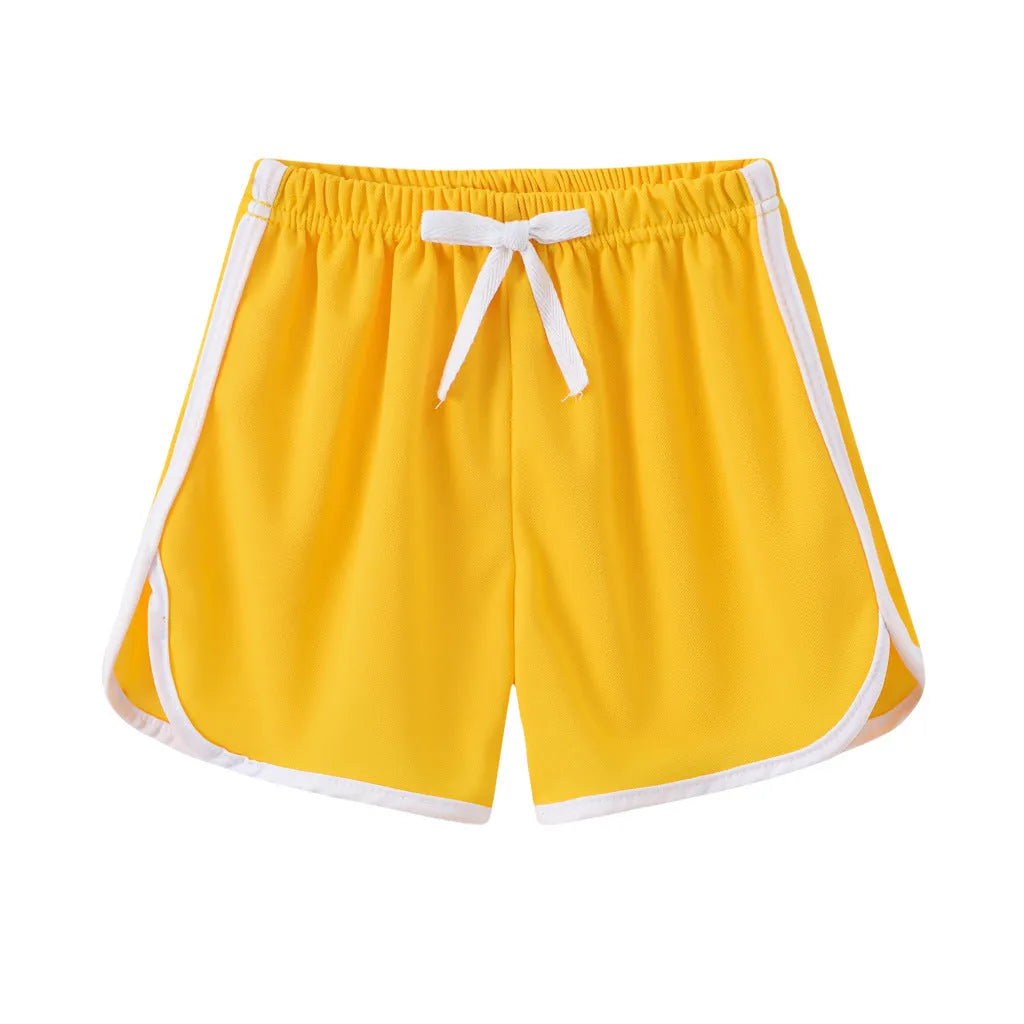Children's polyester beach shorts in multiple prints and solid colours with size range 100-140cm