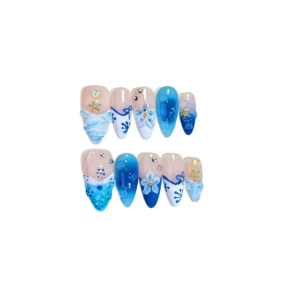 Blue transparent false nails with hand-painted carved summer ice design