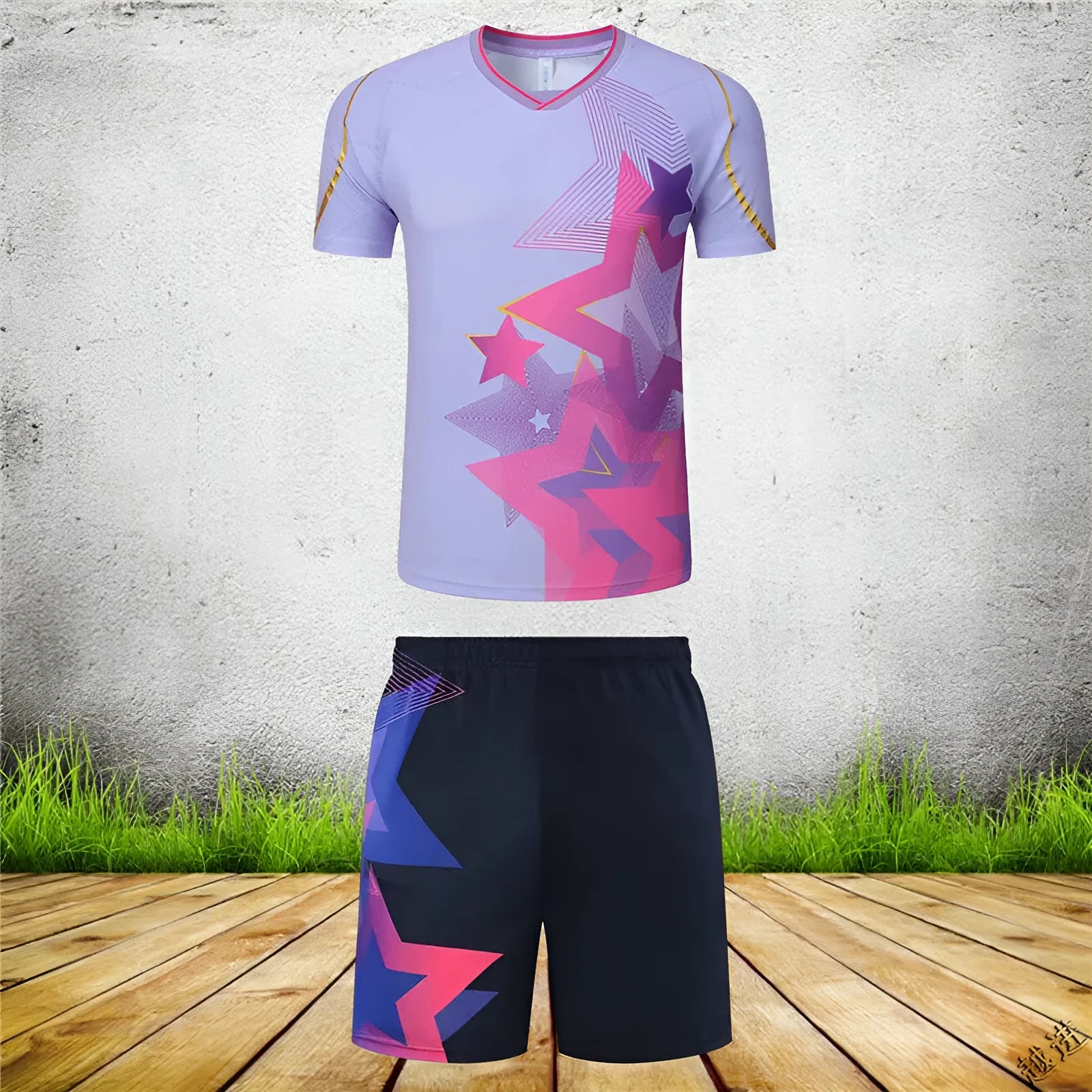 Men's and women's badminton competition sportswear set with short-sleeved polyester jacket and matching trousers.
