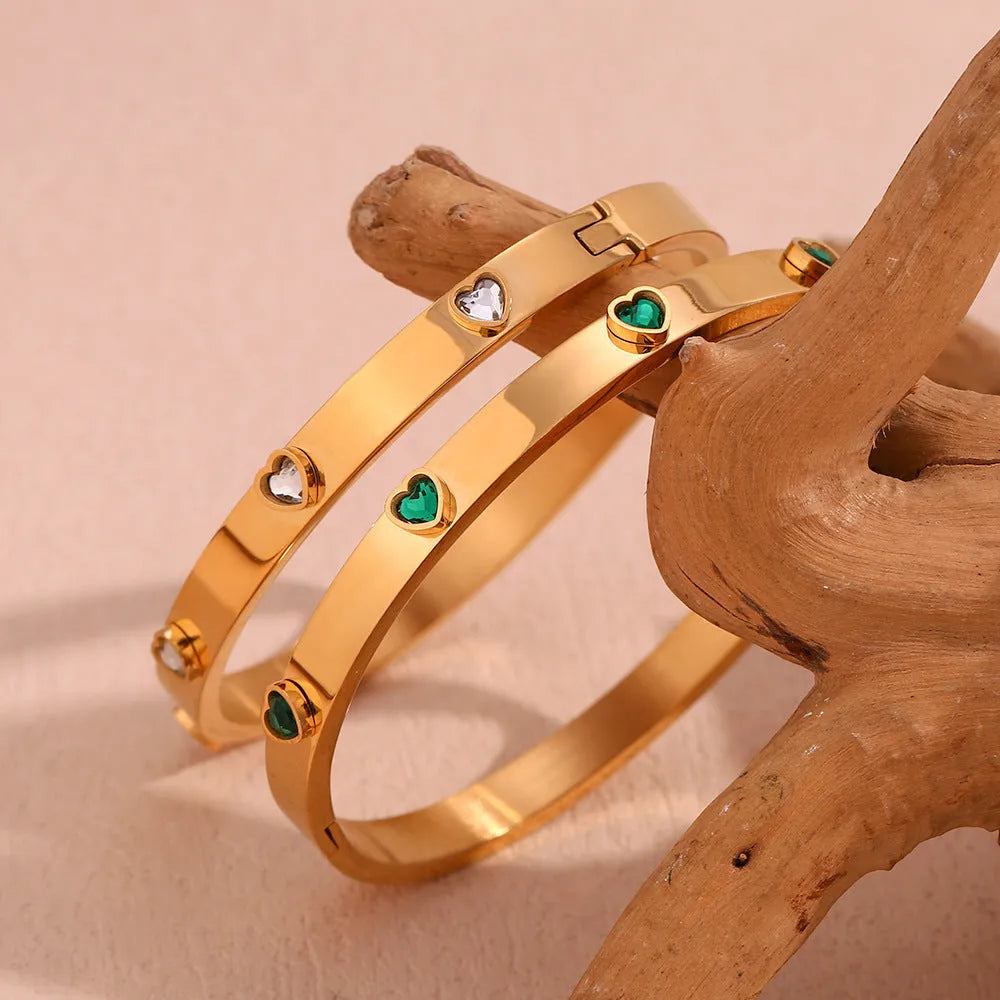 Stainless steel women's bracelet with peach heart design and micro-inlaid detailing in electroplated golden colour