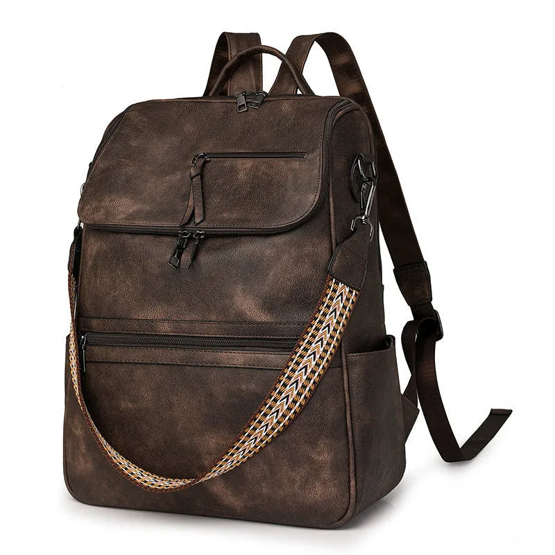 Retro college student backpack in PU leather with curved shoulder straps and solid colour options