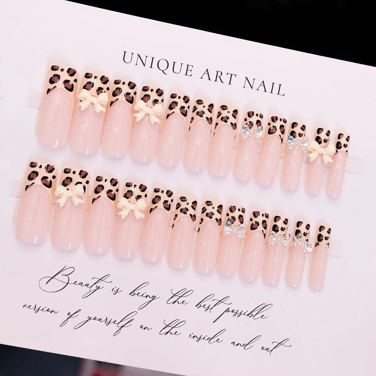 Leopard print and butterfly design false nails in WM296 colour, plastic construction
