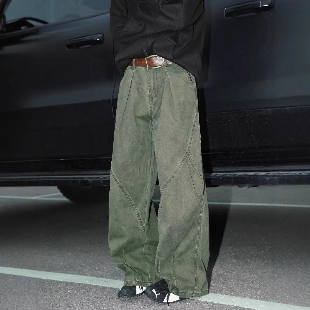 Men's loose pleated straight trousers in black, brown and apricot striped patterns.